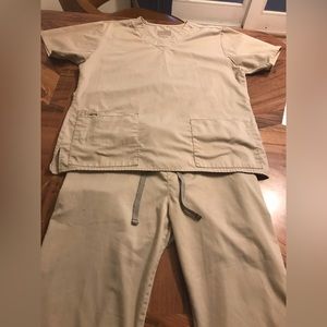 Women’s Tan Scrub top and pants. Selling for $10 the set.